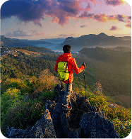 A hiker enjoying a mountain view